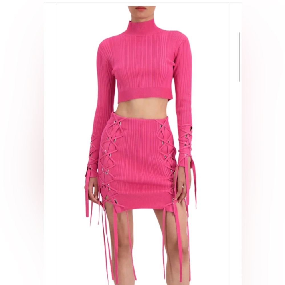 As seen on Chrishell Stause! Herve Leger pink lace up crop and skirt 💕